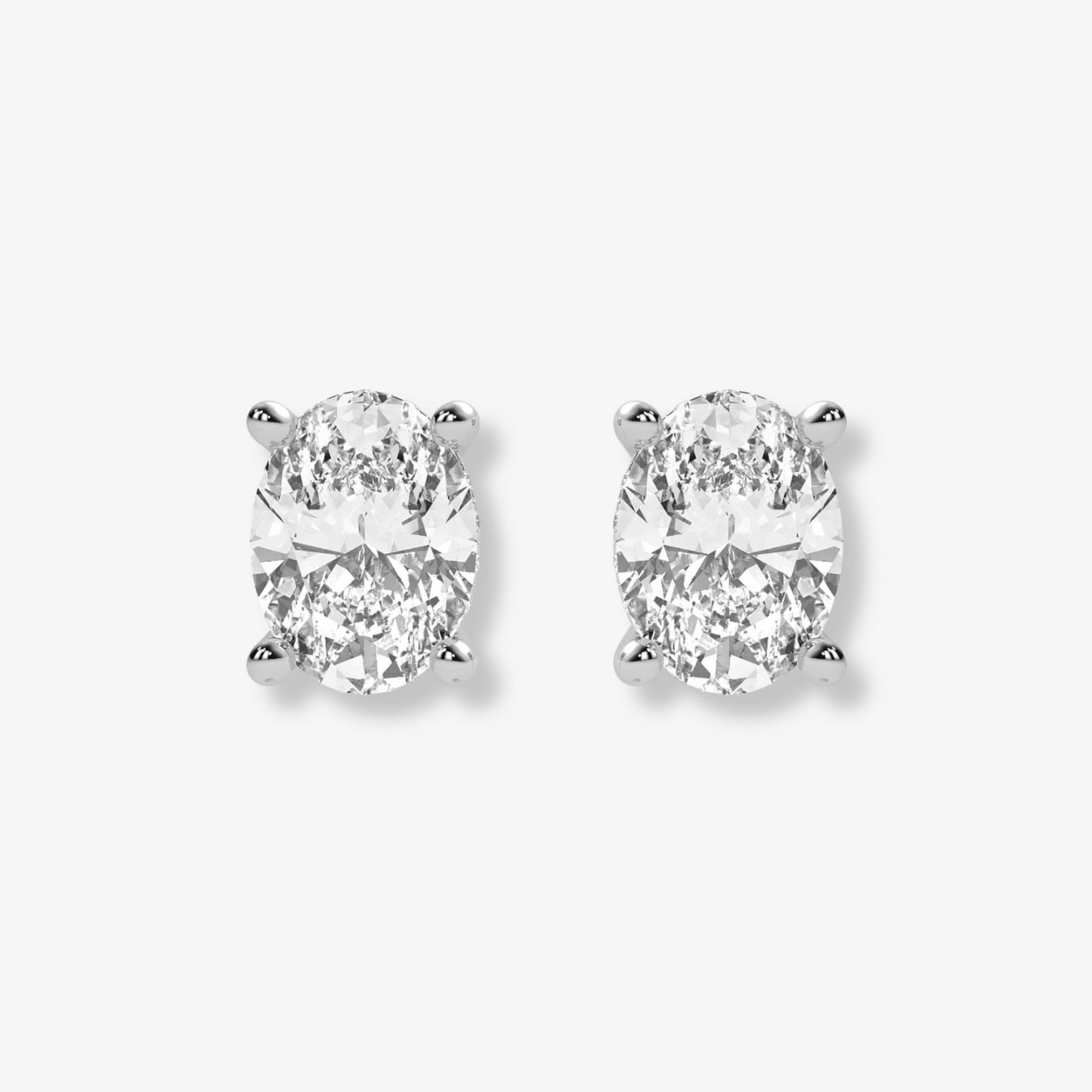 Comfort Fit Four Prong Oval Brilliant Studs