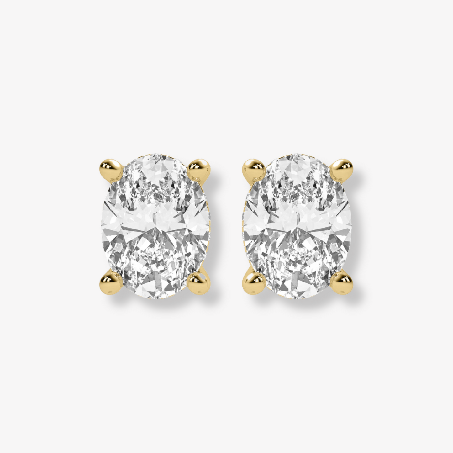 Comfort Fit Four Prong Oval Brilliant Studs