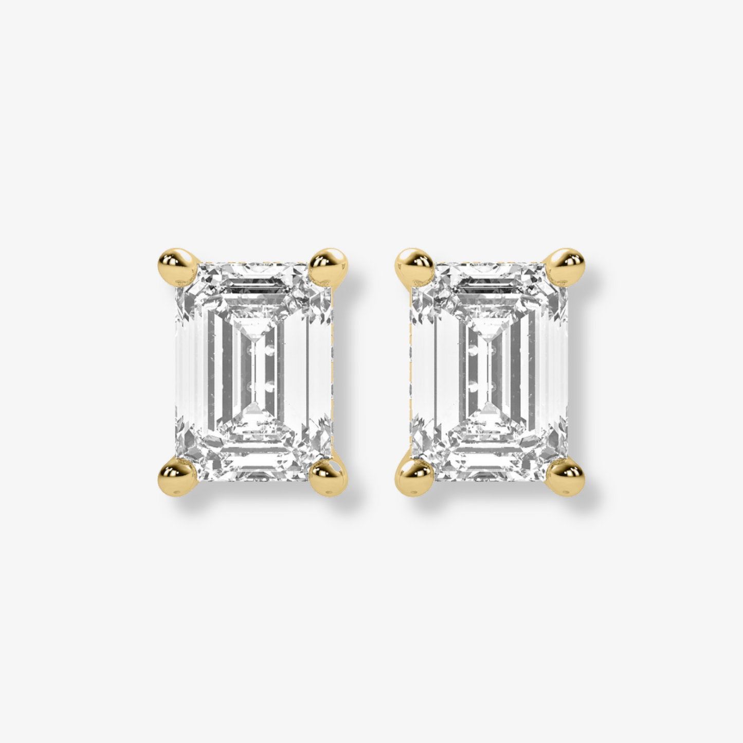 Comfort Fit Four Prong Emerald Cut Studs